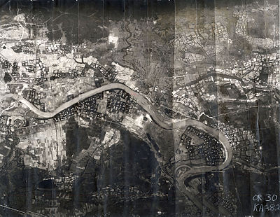 The 3rd Aerospace Rescue Recovery Group used this mosaic reconnaissance photograph to plan Lt. Col. Hambleton and 1st Lt. Mark Clark’s rescue. The Cam Lo Bridge is shown at the far left. On April 7, Hambleton was about 1,000 yards (910 m) above the river and Clark was near the river.[7]:76