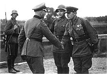 A photo of a German and a Soviet officer shaking hands at the end of the invasion of Poland.